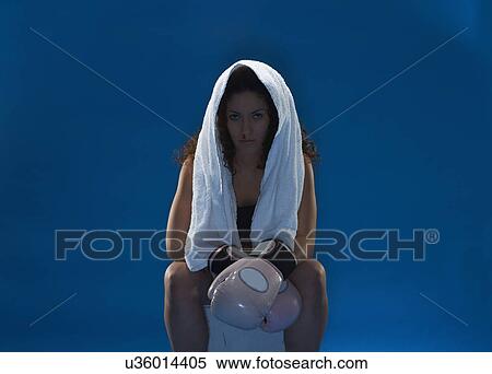 Studio portrait of female boxer with pink boxing gloves View Large Photo Image Stock Photography - Studio portrait of female boxer with pink boxing gloves. Fotosearch