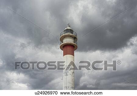 Top section of lighthouse in Huelva, Spain View Large Photo Image Stock Image - Top section of lighthouse in Huelva, Spain. Fotosearch