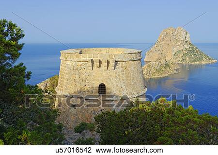 Stock Image - Torre des Savinar and Es Vedra Islands in background, Ibiza, Balearic Islands, Spain. Fotosearch