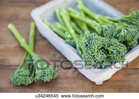 Stock Photography - Tub of fresh broccoli. Fotosearch