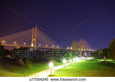 Stock Photography - Vasco da Gama Bridge at night, Lisbon, Portugal. Fotosearch