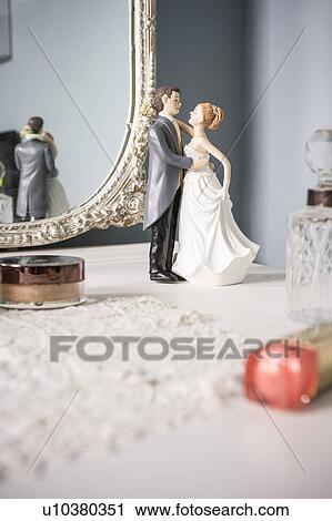 Wedding figurines on dressing table View Large Photo Image Stock Image - Wedding figurines on dressing table. Fotosearch