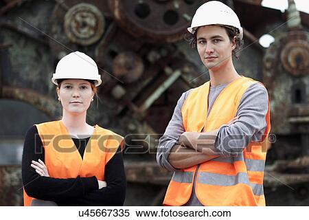 Workers at metal recycling plant View Large Photo Image Stock Photography - Workers at metal recycling plant. Fotosearch