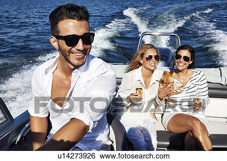 Young adults on boat, Gavle, Sweden View Large Photo Image Stock Photograph - Young adults on boat, Gavle, Sweden. Fotosearch