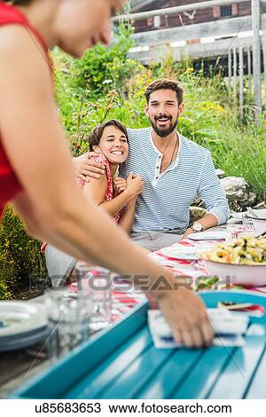 Young couple having lunch, Tyrol, Austria View Large Photo Image Stock Image - Young couple having lunch, Tyrol, Austria. Fotosearch