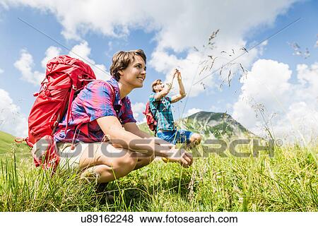 Young couple hiking, Tyrol, Austria View Large Photo Image Stock Photo - Young couple hiking, Tyrol, Austria. Fotosearch