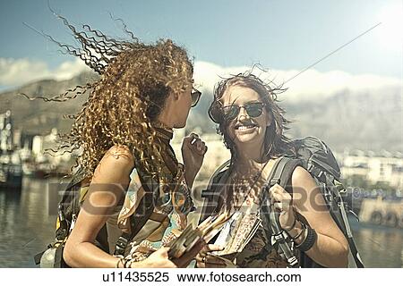 Young women with Table Mountain in background, Cape Town, South Africa View Large Photo Image Stock Photography - Young women with Table Mountain in background, Cape Town, South Africa. Fotosearch