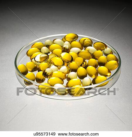 Cod liver oil pills View Large Photo Image Stock Photo - Cod liver oil pills. Fotosearch