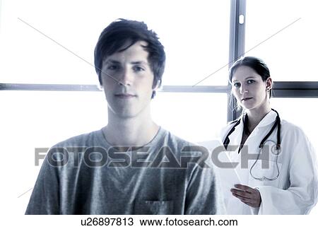 Stock Image - Doctor and patient. Fotosearch
