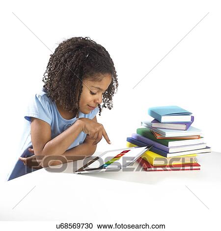 Girl using tablet computer View Large Photo Image Stock Image - Girl using tablet computer. Fotosearch