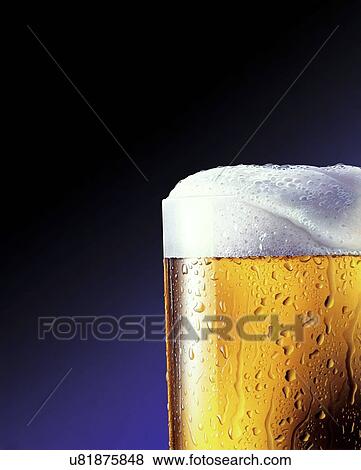 Glass of beer View Large Photo Image Stock Photo - Glass of beer. Fotosearch