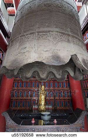 Big bell and religious statue at Giant Wild Goose Pagoda, Xi'an, Shaanxi, China. View Large Photo Image Stock Photo - Big bell and religious statue at Giant Wild Goose Pagoda, Xi'an, Shaanxi, China.. Fotosearch