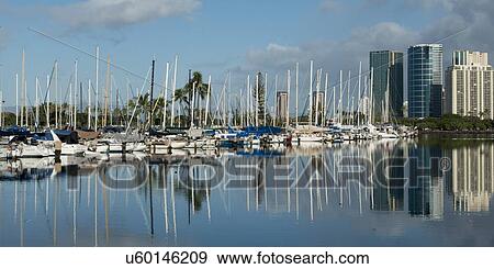 Stock Photo - Boats at a harbor, Waikiki, Honolulu, Oahu, Hawaii, USA. Fotosearch