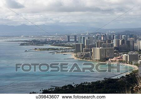 Stock Photo - Buildings along beachfront viewed from Diamond Head, Waikiki, Kapahulu, Honolulu, Oahu, Hawaii, USA. Fotosearch