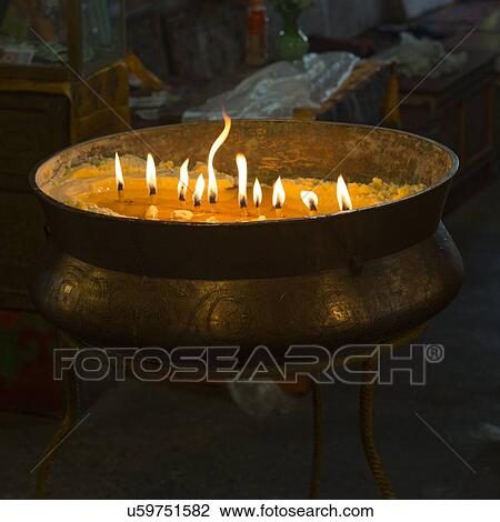 Burning candles in Drepung Monastery, Lhasa, Tibet, China View Large Photo Image Stock Image - Burning candles in Drepung Monastery, Lhasa, Tibet, China. Fotosearch