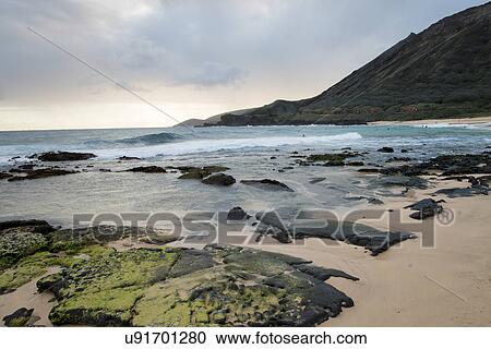 Stock Image - Clouds over Sandy Beach, Hawaii Kai, Honolulu, Oahu, Hawaii, USA. Fotosearch
