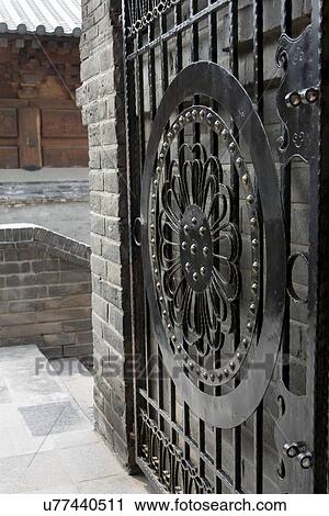 Stock Image - Opened gate at Giant Wild Goose Pagoda, Xi'an, Shaanxi, China.. Fotosearch