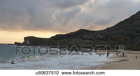 People enjoying the beach, Sandy Beach, Hawaii Kai, Honolulu, Oahu, Hawaii, USA View Large Photo Image Stock Image - People enjoying the beach, Sandy Beach, Hawaii Kai, Honolulu, Oahu, Hawaii, USA. Fotosearch