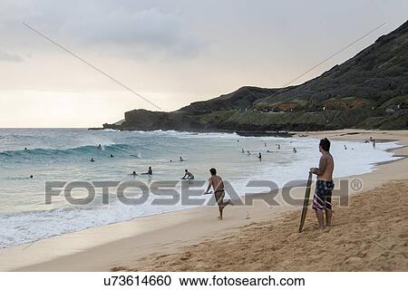 Stock Image - People enjoying the beach, Sandy Beach, Hawaii Kai, Honolulu, Oahu, Hawaii, USA. Fotosearch