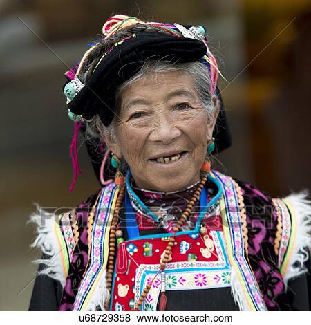 Stock Photo - Portrait of an elderly Tibetan woman smiling, Lhasa, Tibet, China. Fotosearch