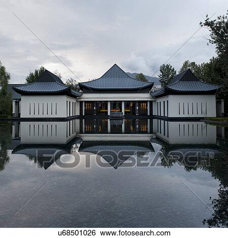 Reflection of St. Regis Hotel in water, Lhasa, Tibet, China View Large Photo Image Stock Photograph - Reflection of St. Regis Hotel in water, Lhasa, Tibet, China. Fotosearch