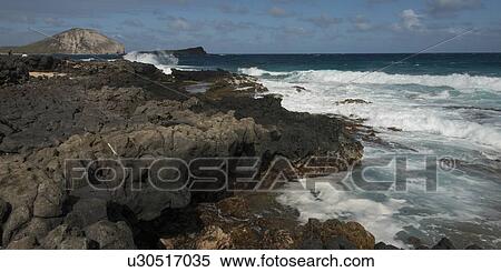 Stock Photography - Rock formations on the coast, Waimanalo, Makapuu Point, Honolulu, Oahu, Hawaii, USA. Fotosearch