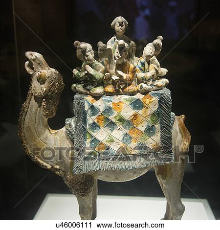 Stock Image - Statue of Sancai Camel with Musicians displayed at Shaanxi History Museum, Xi'an, Shaanxi, China.. Fotosearch