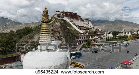 Stupa with Potala Palace in the background, Lhasa, Tibet, China View Large Photo Image Picture - Stupa with Potala Palace in the background, Lhasa, Tibet, China. Fotosearch