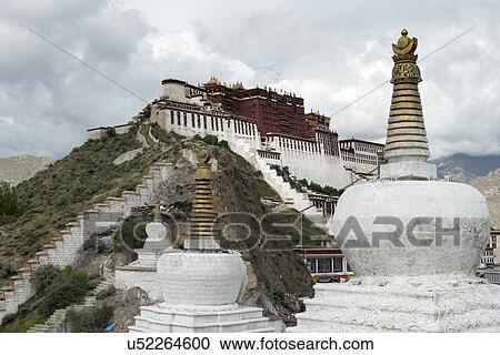 Stupas with Potala Palace in the background, Lhasa, Tibet, China View Large Photo Image Stock Image - Stupas with Potala Palace in the background, Lhasa, Tibet, China. Fotosearch
