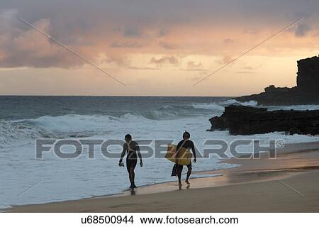 Surfers on the beach, Sandy Beach, Hawaii Kai, Honolulu, Oahu, Hawaii, USA View Large Photo Image Picture - Surfers on the beach, Sandy Beach, Hawaii Kai, Honolulu, Oahu, Hawaii, USA. Fotosearch