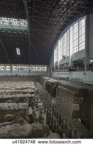 Stock Photo - Terracotta warriors and horse statue at the Terracotta Warriors Army Museum, Xi'an, China.. Fotosearch