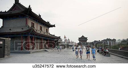 Tourists at ancient city wall, Xi'an, China. View Large Photo Image Stock Image - Tourists at ancient city wall, Xi'an, China.. Fotosearch