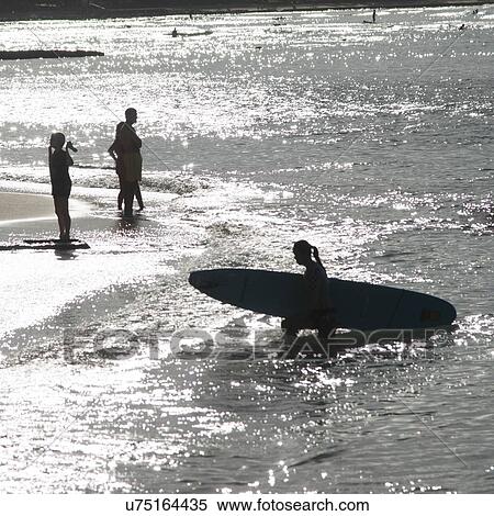 Stock Photography - Tourists on the beach, Waikiki, Honolulu, Oahu, Hawaii, USA. Fotosearch