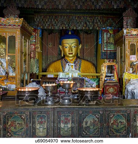 Votive candles burning in front of Buddha statue in Drepung Monastery, Lhasa, Tibet, China View Large Photo Image Stock Image - Votive candles burning in front of Buddha statue in Drepung Monastery, Lhasa, Tibet, China. Fotosearch