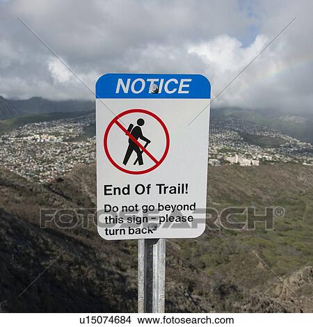 Warning sign for hikers with a city in background viewed from Diamond Head, Kapahulu, Honolulu, Oahu, Hawaii, USA View Large Photo Image Picture - Warning sign for hikers with a city in background viewed from Diamond Head, Kapahulu, Honolulu, Oahu, Hawaii, USA. Fotosearch