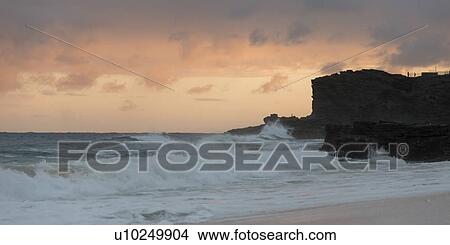 Picture - Waves on the beach at sunset, Sandy Beach, Hawaii Kai, Honolulu, Oahu, Hawaii, USA. Fotosearch