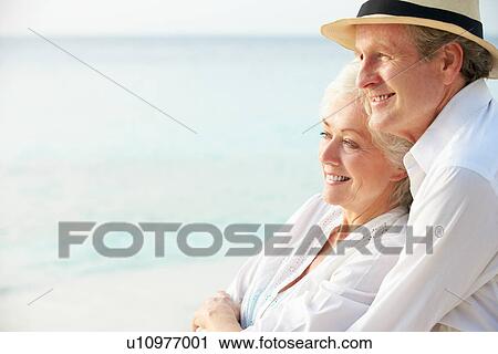 Affectionate Senior Couple On Tropical Beach Holiday View Large Photo Image Stock Image - Affectionate Senior Couple On Tropical Beach Holiday. Fotosearch