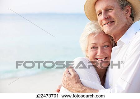 Affectionate Senior Couple On Tropical Beach Holiday View Large Photo Image Stock Image - Affectionate Senior Couple On Tropical Beach Holiday. Fotosearch