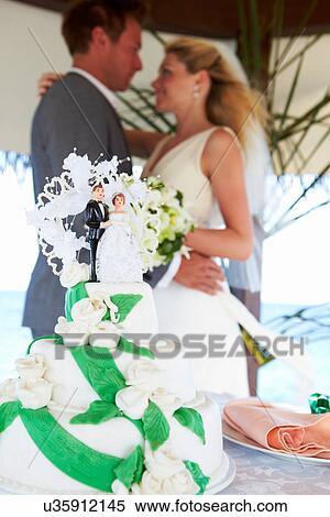 Beach Wedding Ceremony With Cake In Foreground View Large Photo Image Stock Photography - Beach Wedding Ceremony With Cake In Foreground. Fotosearch