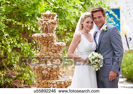 Stock Photograph - Bride And Groom At Wedding Ceremony. Fotosearch