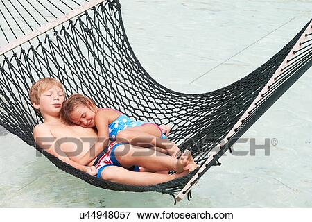 Brother And Sister Relaxing In Beach Hammock View Large Photo Image Stock Photo - Brother And Sister Relaxing In Beach Hammock . Fotosearch