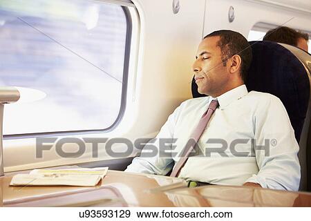 Businessman Resting On Train View Large Photo Image Stock Photo - Businessman Resting On Train. Fotosearch