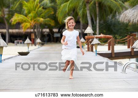 Child Running Along Wooden Jetty View Large Photo Image Stock Image - Child Running Along Wooden Jetty. Fotosearch
