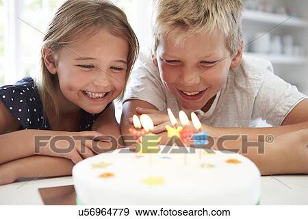 Children Celebrating Birthday With Cake View Large Photo Image Stock Photo - Children Celebrating Birthday With Cake. Fotosearch