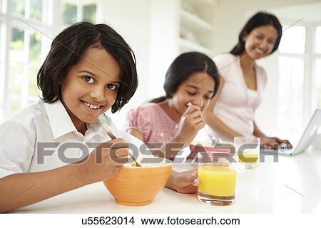 Children Having Breakfast With Mother Before School View Large Photo Image Picture - Children Having Breakfast With Mother Before School. Fotosearch