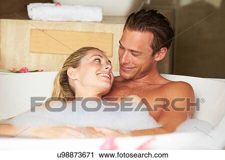 Couple Relaxing In Bubble Bath Together View Large Photo Image Stock Image - Couple Relaxing In Bubble Bath Together. Fotosearch