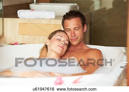 Couple Relaxing In Bubble Bath Together View Large Photo Image Stock Photo - Couple Relaxing In Bubble Bath Together. Fotosearch