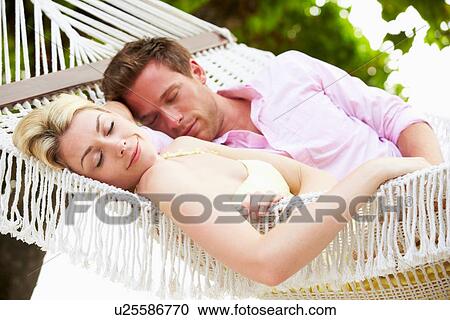 Couple Sleeping In Beach Hammock View Large Photo Image Stock Image - Couple Sleeping In Beach Hammock. Fotosearch