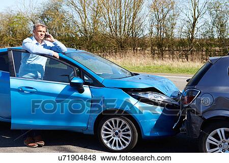 Driver Making Phone Call After Traffic Accident View Large Photo Image Stock Photo - Driver Making Phone Call After Traffic Accident. Fotosearch
