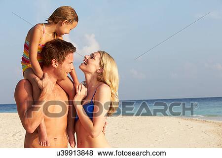 Family On Tropical Beach Holiday View Large Photo Image Stock Photo - Family On Tropical Beach Holiday. Fotosearch